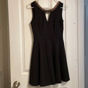Black and gold mini dress